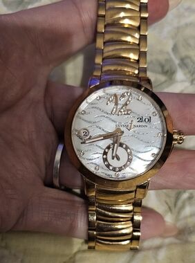 Replica Ulysse Nardin Gold Tone Watch with White Mother-of-Pearl Dial